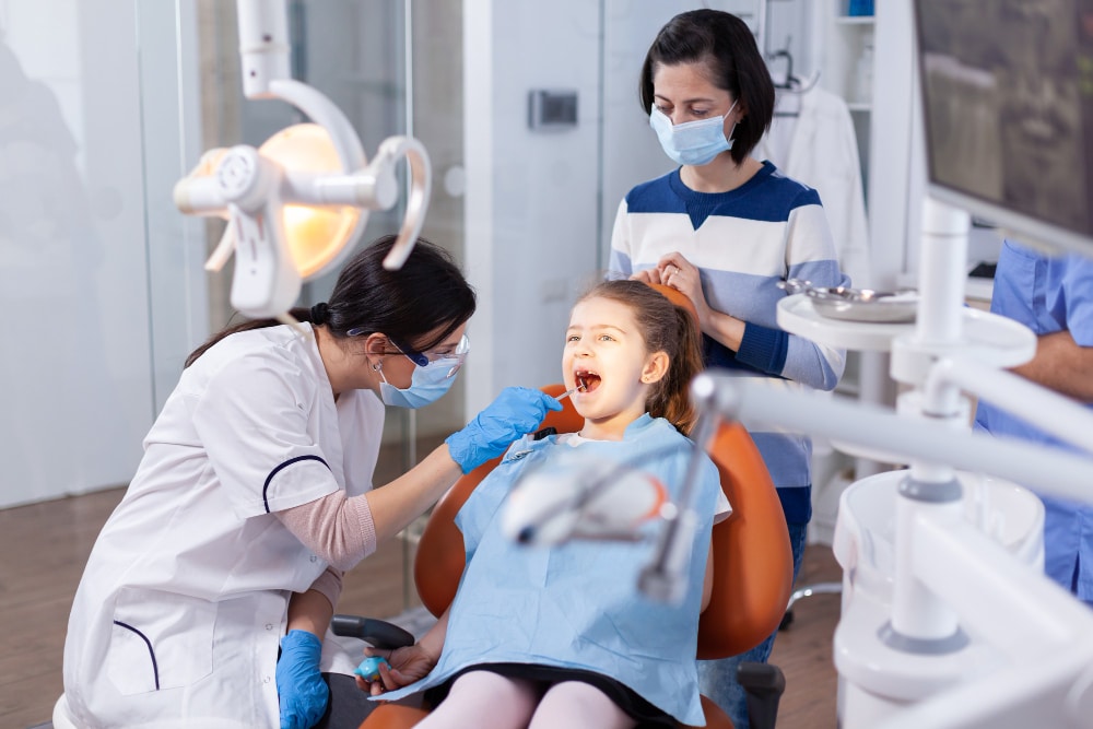 Girl undergoing dental check-up with pediatric dentist at Canal Dentistry of Crawfordsville